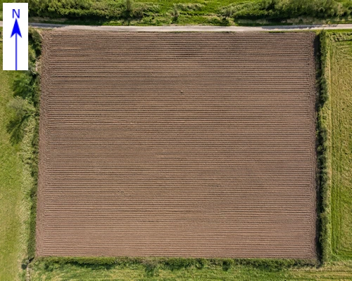 Aerial view of Farmer Fruitless's ploughed field.